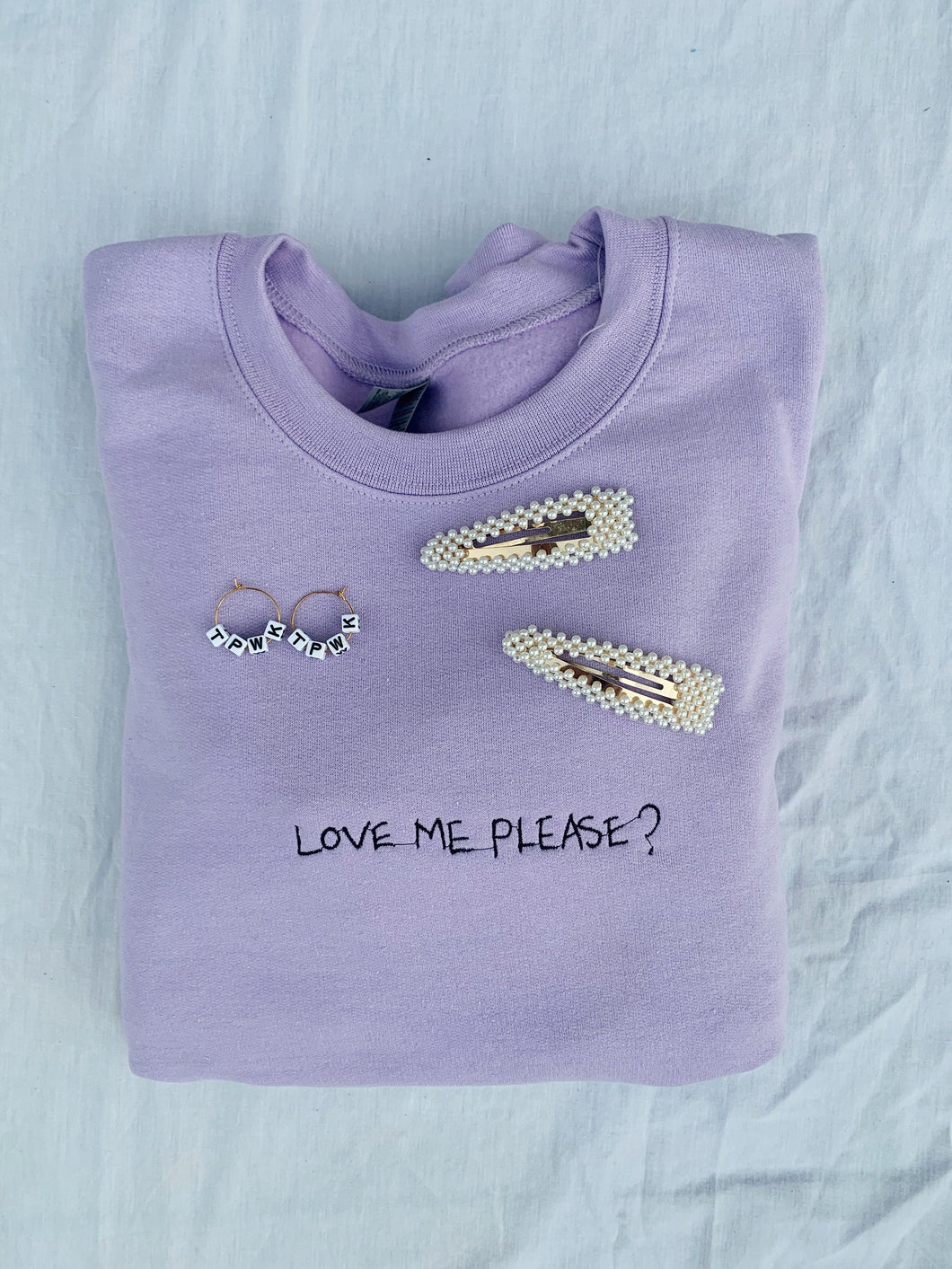 The Love Me Please Sweater.